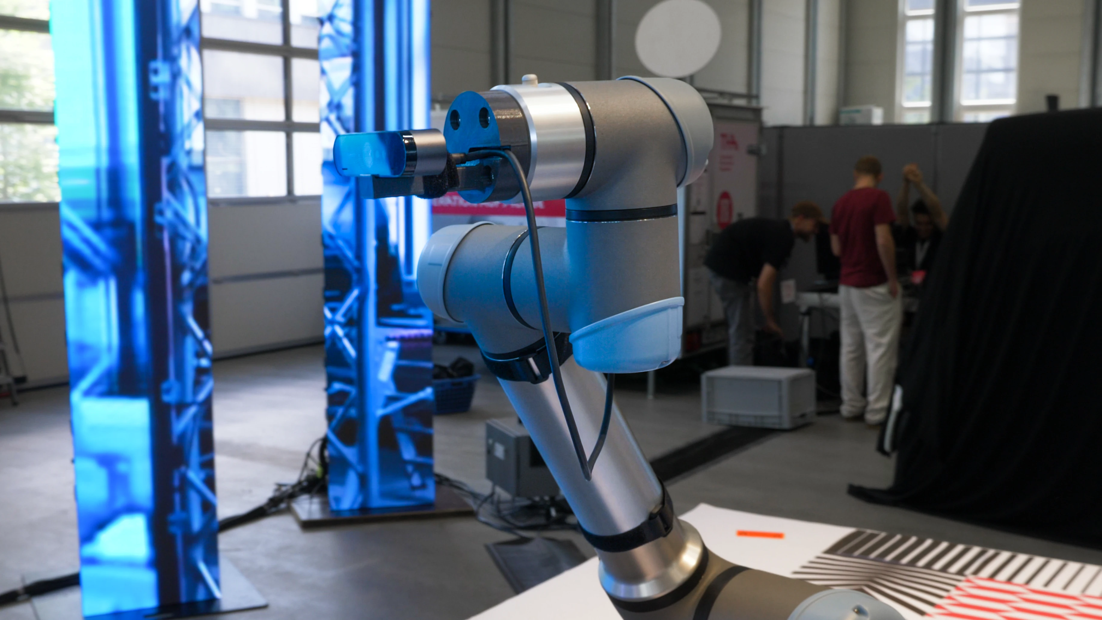 B-Bot installation with robotic arm and LED screens
